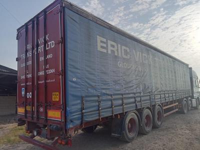 Montracon Tri axle curtain side trailer